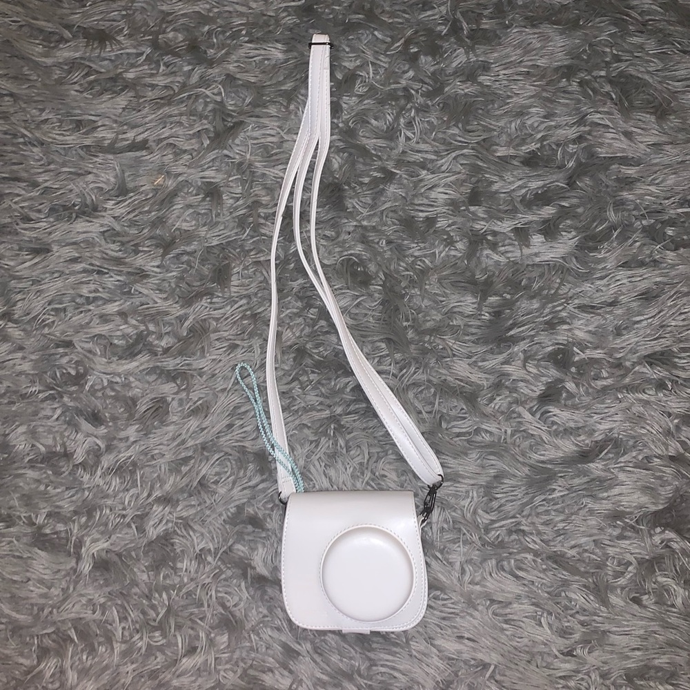 POLAROID CASE WOTH CLIP AT BOTTOM